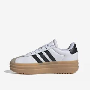 Adidas White and Black Sneakers with platformTan Sole; used; 6 kids